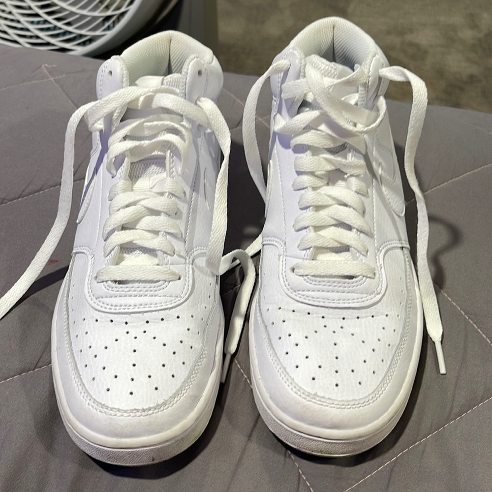 worn once maybe twice. nike high top shoes.
